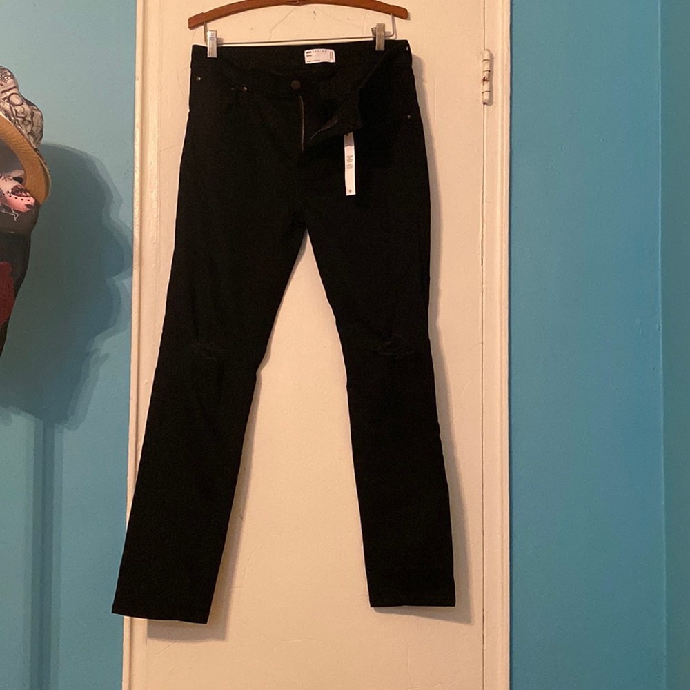 Black stretch jeans for men with  tears on the knee